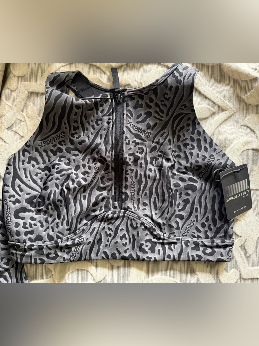 Savage X Fenty Black and Gray Animal-Print Sports Bra with matching leggings.